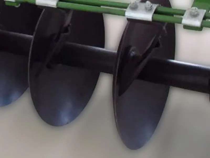 Plow blade spacer